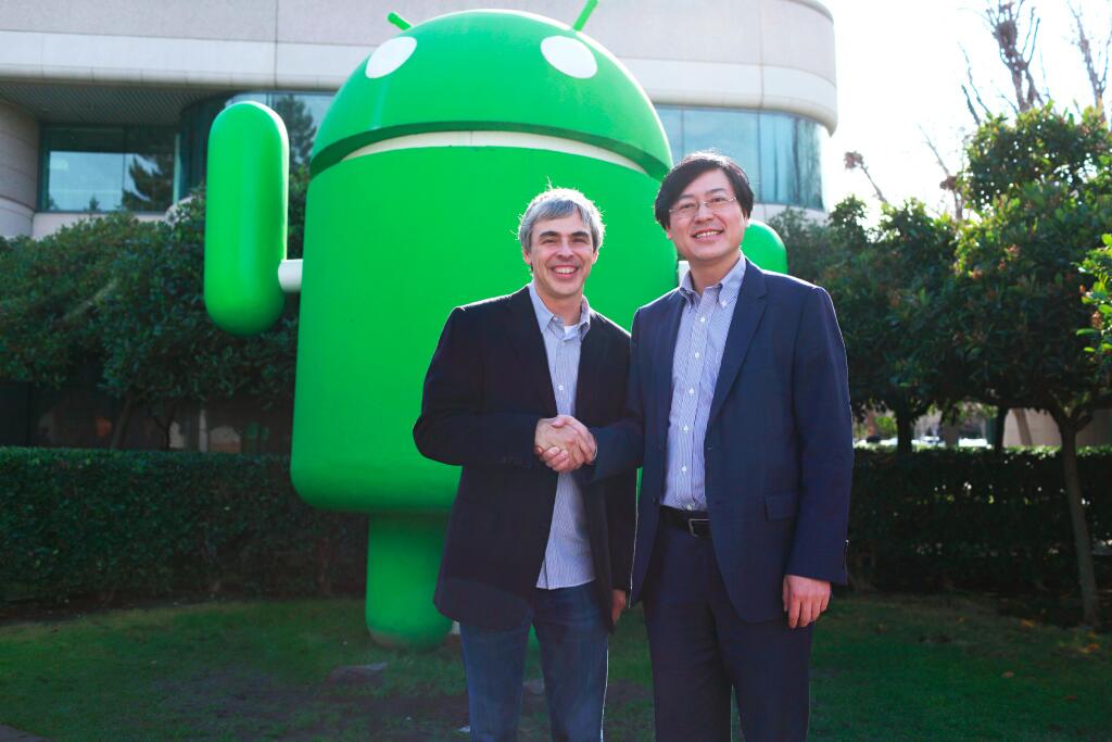 CEO de Google Larry Page y el director ejecutivo de Lenovo Yang Yuanqing